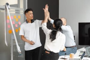 Employees High-Fiving